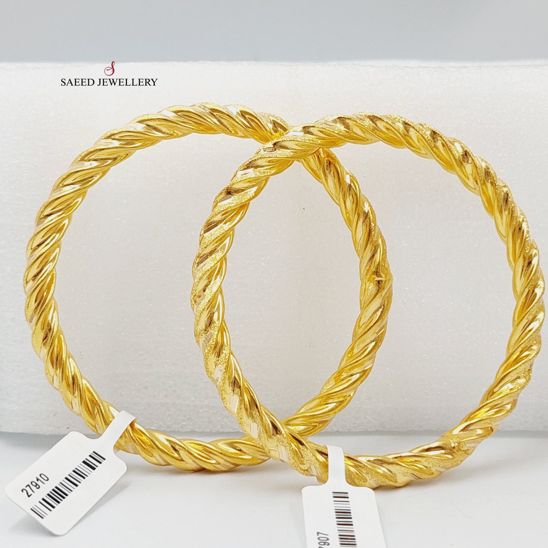 Bold Twisted Hollow Bangle Made Of 21K Yellow Gold<br><br>
<br> by Saeed Jewelry-27899