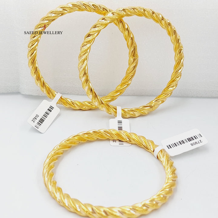 Bold Twisted Hollow Bangle Made Of 21K Yellow Gold<br><br>
<br> by Saeed Jewelry-27899