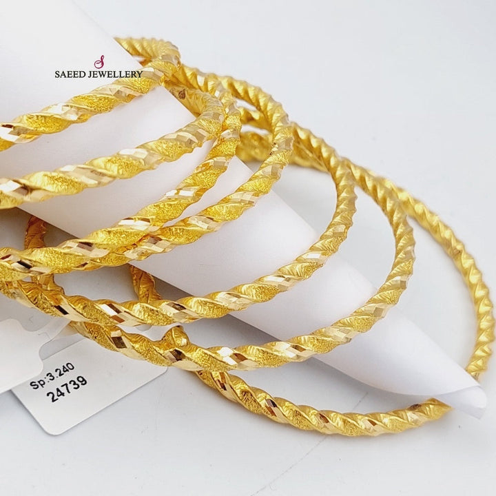 Hollow Twisted Bangle Made of 21K Yellow Gold by Saeed Jewelry-27264